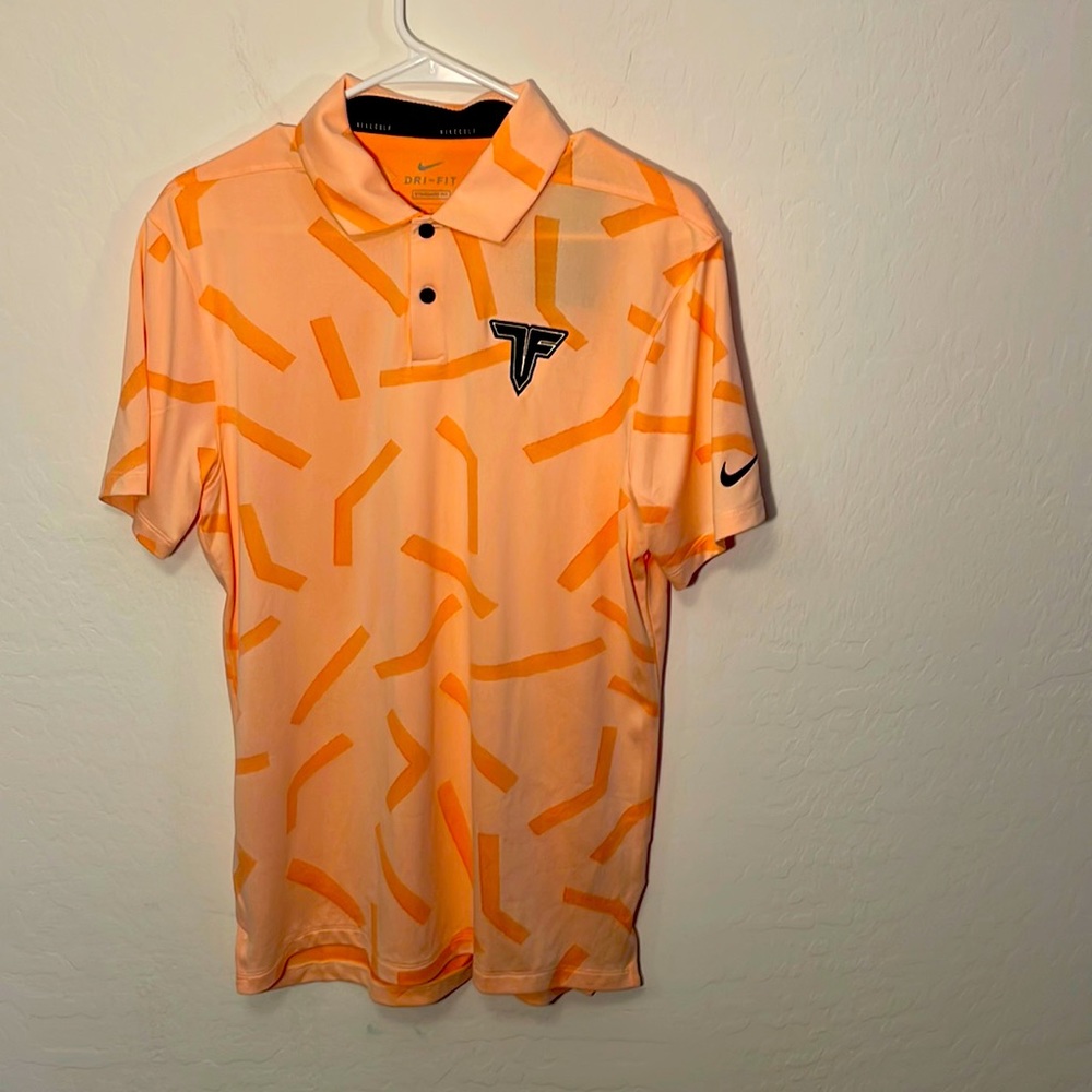Orange Nike golf polo